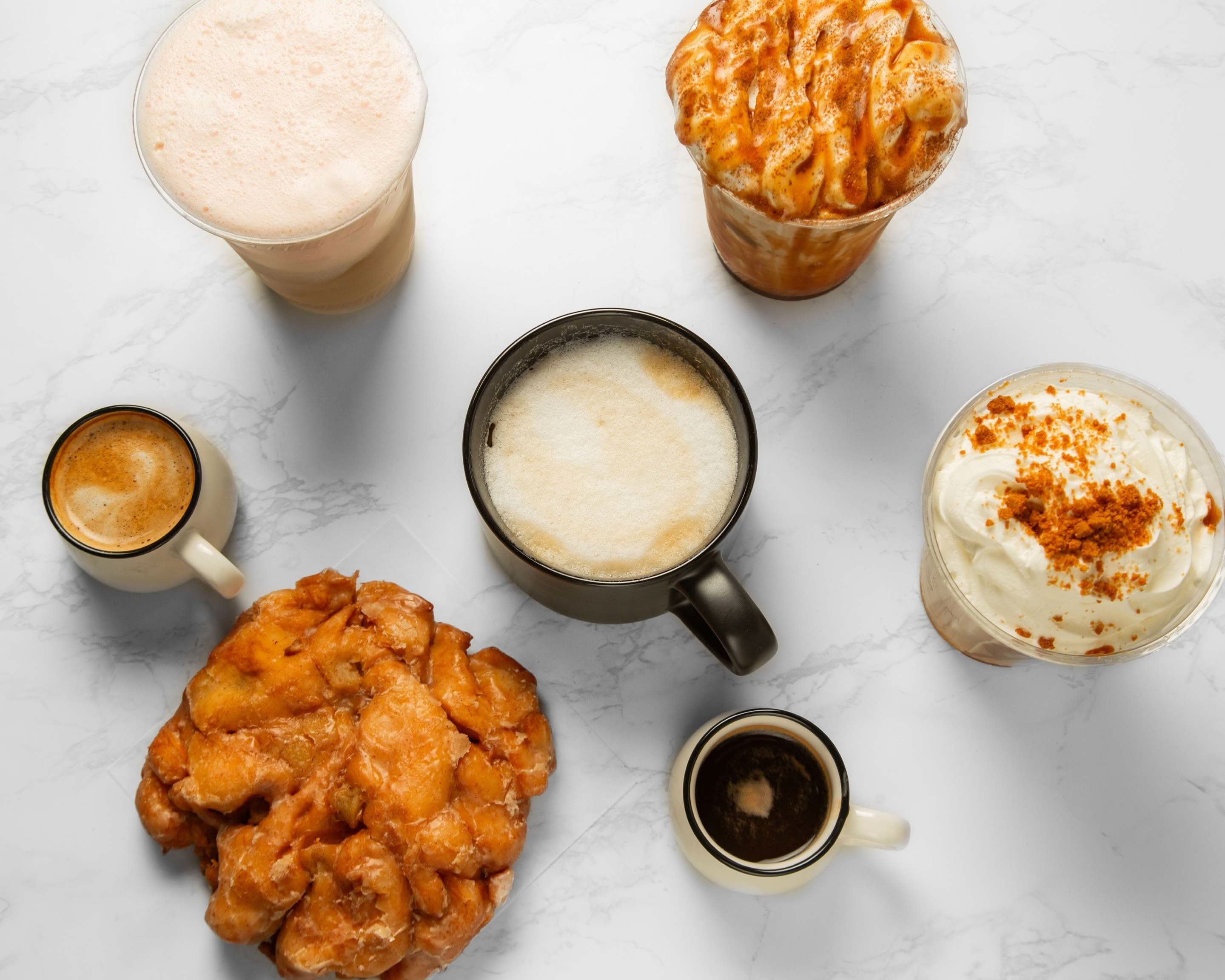 Coffee drinks and a glazed apple fritter pastry from Barriques cafe in Madison