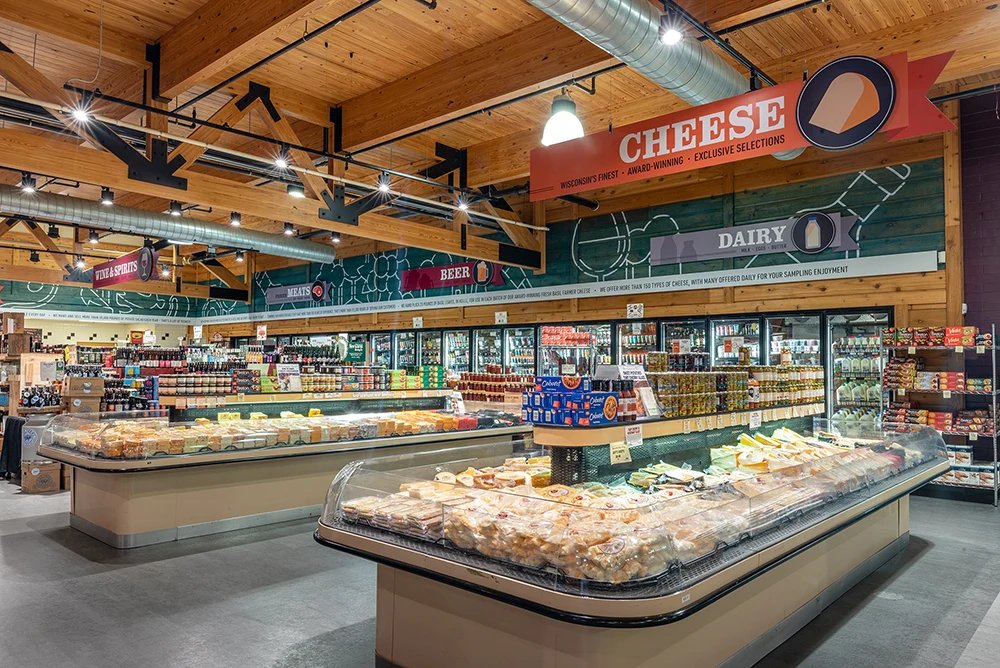 Cheese counter and dairy section inside Brennan's Market on Watts Road in Madison