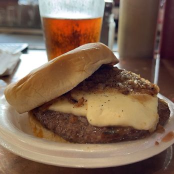 Brick Burger with melted brick cheese and grilled onions at Village Bar in Madison