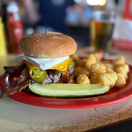 Going Bananas burger with cheese and tots at Players Sports Bar in Madison