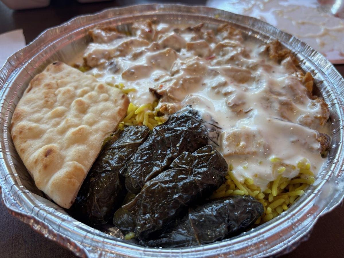 Gyro platter over rice with stuffed grape leaves and pita from Gyro Guyz in Madison