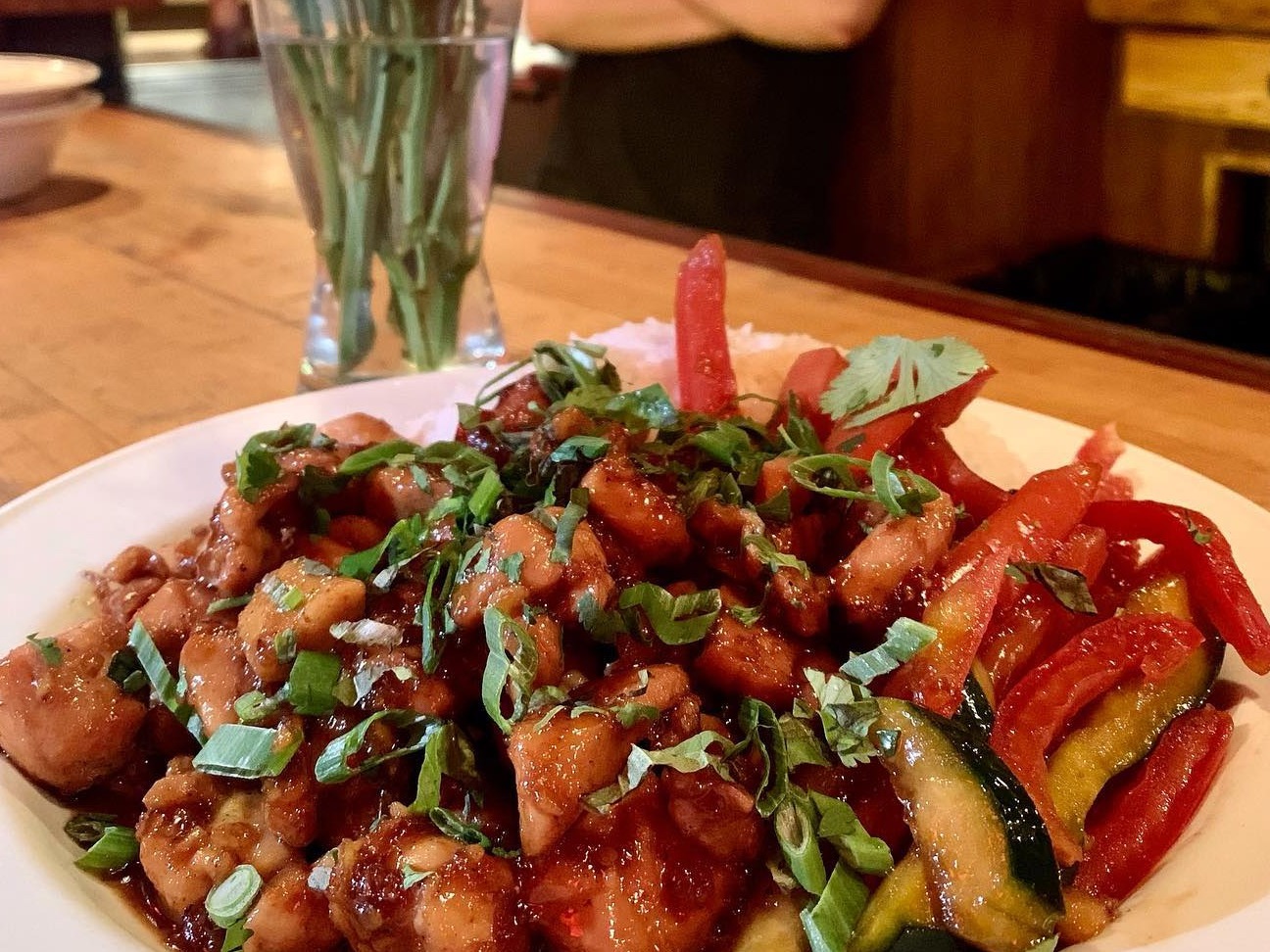 Three cup chicken with fresh herbs and sauteed peppers at Nattspil on King Street in downtown Madison